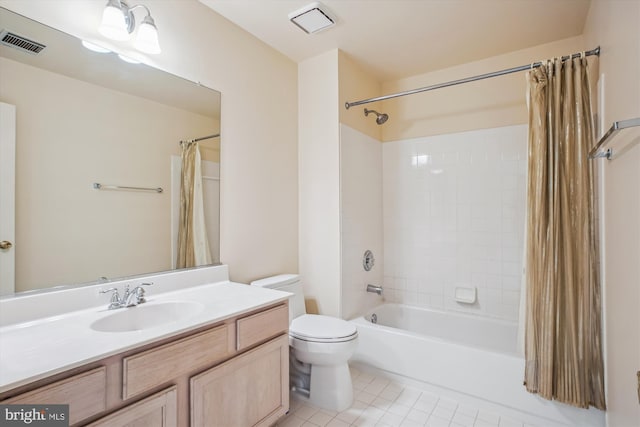 bathroom with visible vents, shower / tub combo, vanity, tile patterned floors, and toilet
