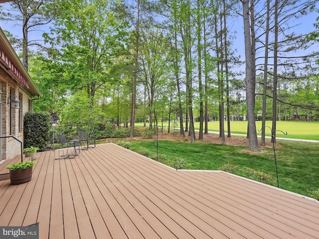 deck featuring a yard