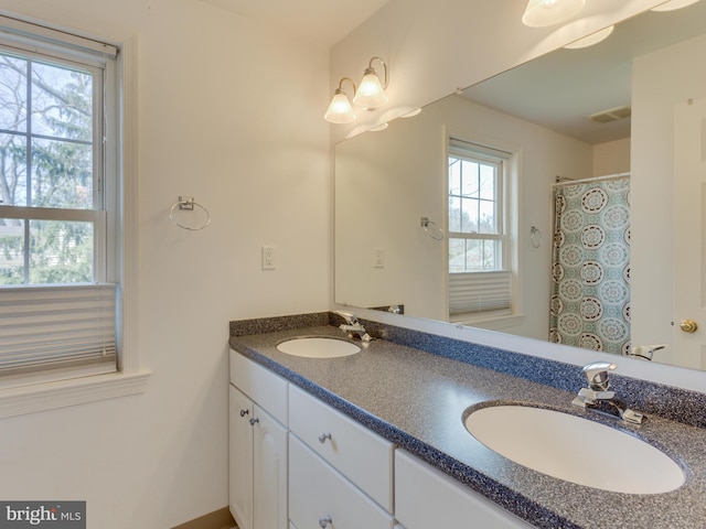 112 E Jefferson St E, Falls Church, VA 22046 - bathroom featuring double vanity