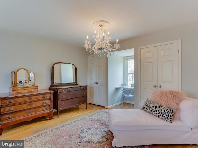 112 E Jefferson St E, Falls Church, VA 22046 - living area featuring a chandelier and light wood-type flooring
