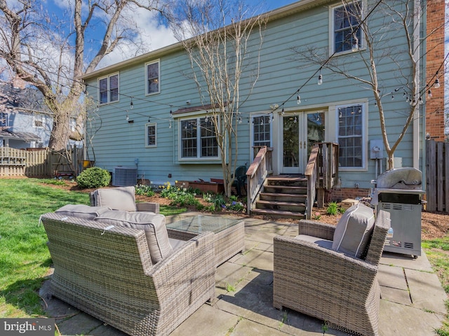 112 E Jefferson St E, Falls Church, VA 22046 - rear view of house with french doors, an outdoor living space, a patio area, and central air condition unit