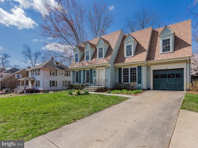 112 E Jefferson St E, Falls Church, VA 22046 - view of front of house featuring roof with shingles, a front yard, driveway, and a garage