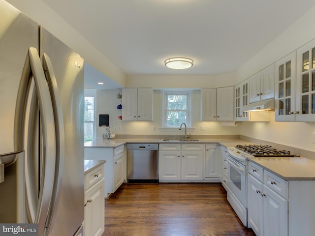 112 E Jefferson St E, Falls Church, VA 22046 - kitchen featuring stainless steel appliances, a sink, under cabinet range hood, white cabinetry, and recessed lighting