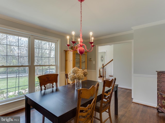 112 E Jefferson St E, Falls Church, VA 22046 - dining area featuring a chandelier, plenty of natural light, dark wood-type flooring, crown molding, and stairs