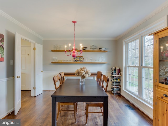 112 E Jefferson St E, Falls Church, VA 22046 - dining area with a chandelier, dark wood-type flooring, ornamental molding, and baseboards