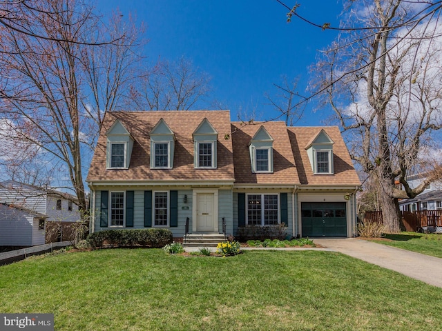 112 E Jefferson St E, Falls Church, VA 22046 - new england style home featuring concrete driveway and a garage