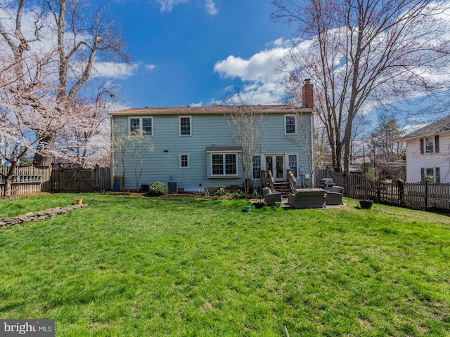 112 E Jefferson St E, Falls Church, VA 22046 - rear view of property with a chimney and outdoor lounge area