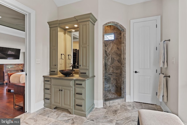 360 Fishing Creek Valley Rd, Harrisburg, PA 17112 - ensuite bathroom with tiled shower, baseboards, and vanity