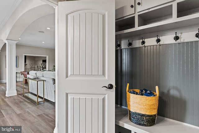 360 Fishing Creek Valley Rd, Harrisburg, PA 17112 - mudroom with decorative columns, arched walkways, wood finished floors, crown molding, and recessed lighting