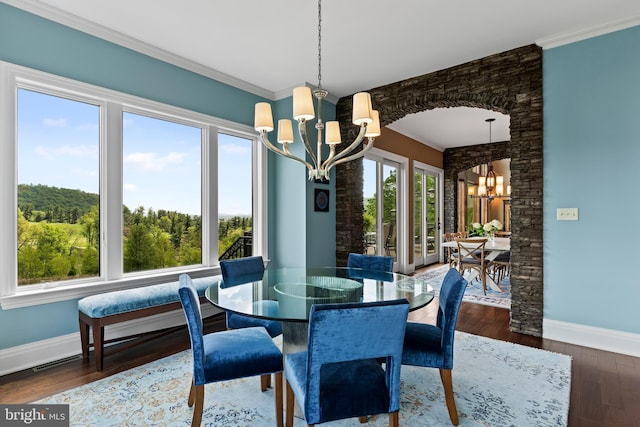 360 Fishing Creek Valley Rd, Harrisburg, PA 17112 - dining space with a chandelier, baseboards, wood finished floors, and crown molding