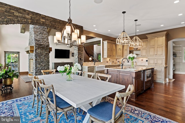 360 Fishing Creek Valley Rd, Harrisburg, PA 17112 - dining space featuring a chandelier, arched walkways, dark wood-type flooring, recessed lighting, and crown molding