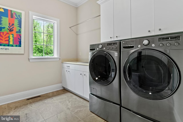 360 Fishing Creek Valley Rd, Harrisburg, PA 17112 - washroom featuring washing machine and dryer, cabinet space, baseboards, and crown molding
