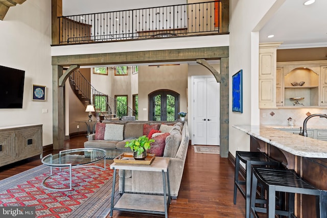 360 Fishing Creek Valley Rd, Harrisburg, PA 17112 - living room with baseboards, dark wood-type flooring, stairway, recessed lighting, and a towering ceiling
