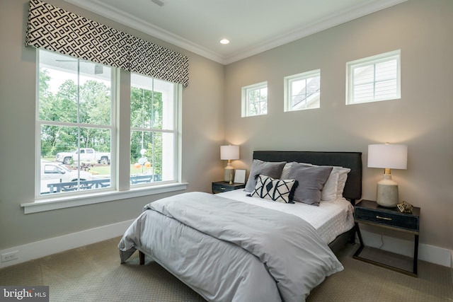 carpeted bedroom with ornamental molding, recessed lighting, multiple windows, and baseboards