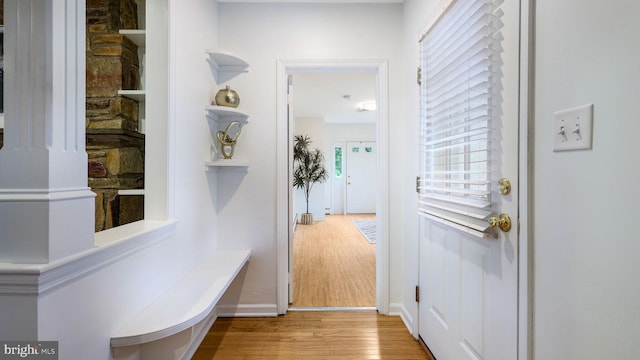 hallway featuring wood finished floors