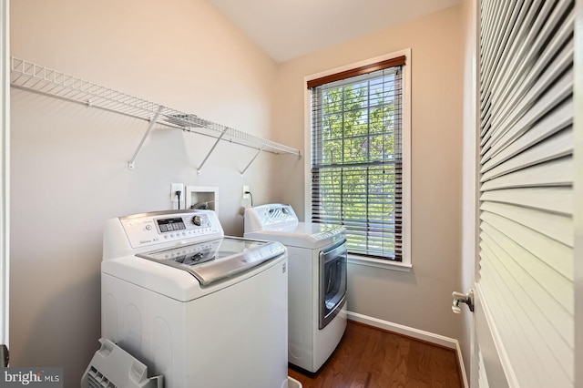 1308 Lowman St, Baltimore, MD 21230 - laundry area with washing machine and clothes dryer, dark wood-style flooring, and baseboards