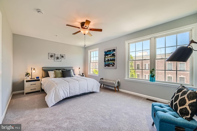 1308 Lowman St, Baltimore, MD 21230 - carpeted bedroom featuring baseboards and a ceiling fan