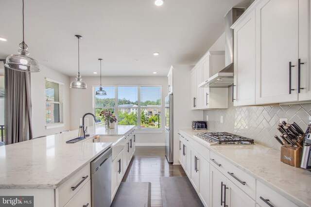 5510 Woodyard Rd, Upper Marlboro, MD 20772 - kitchen with stainless steel appliances, a kitchen island with sink, backsplash, white cabinets, and dark wood-style floors