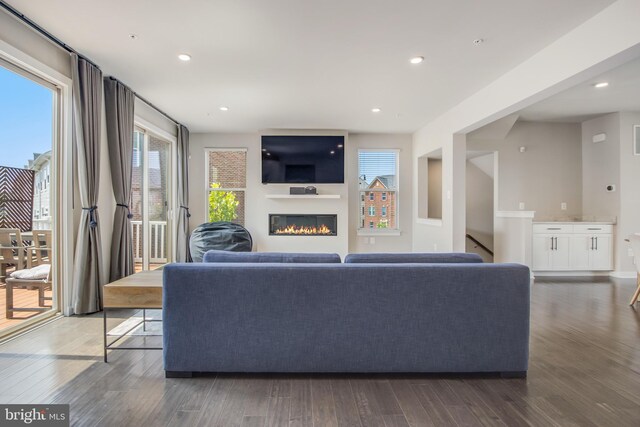 5510 Woodyard Rd, Upper Marlboro, MD 20772 - living room with a glass covered fireplace, wood finished floors, and recessed lighting