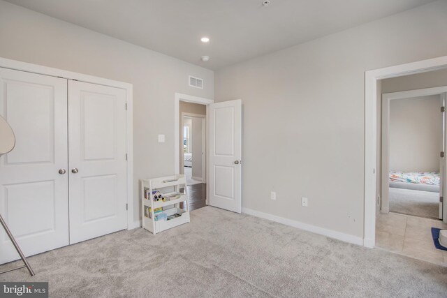 5510 Woodyard Rd, Upper Marlboro, MD 20772 - unfurnished bedroom featuring carpet flooring, baseboards, a closet, and recessed lighting