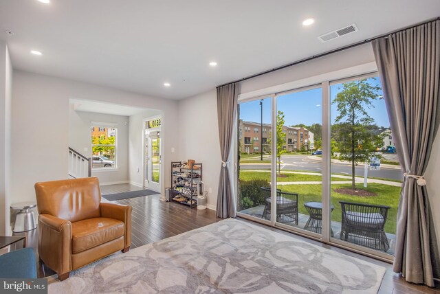5510 Woodyard Rd, Upper Marlboro, MD 20772 - sitting room with wood finished floors, baseboards, recessed lighting, and stairway