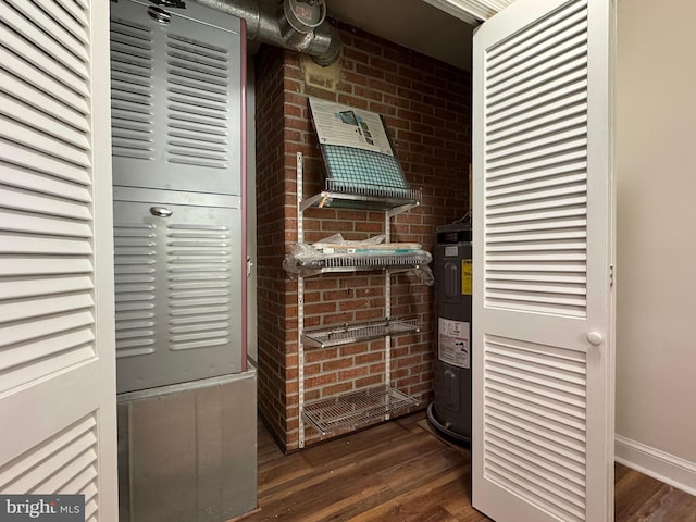 utility room with electric water heater
