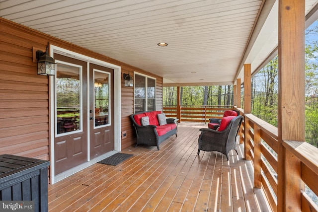 sunroom with an outdoor hangout area