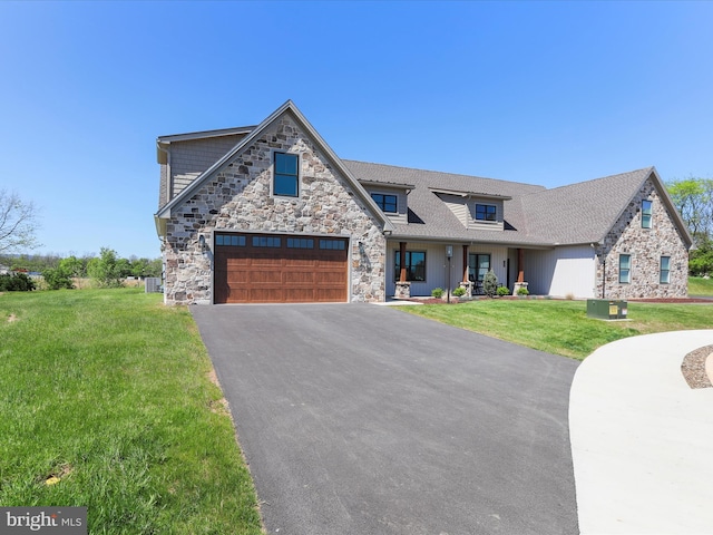 149 Matthew Dr, Chambersburg, PA 17201 - craftsman-style home with a garage, driveway, stone siding, and a front lawn