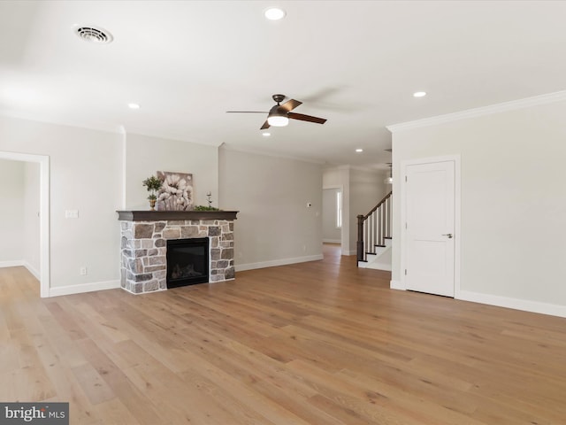149 Matthew Dr, Chambersburg, PA 17201 - unfurnished living room featuring ceiling fan, light wood finished floors, stairs, baseboards, and ornamental molding