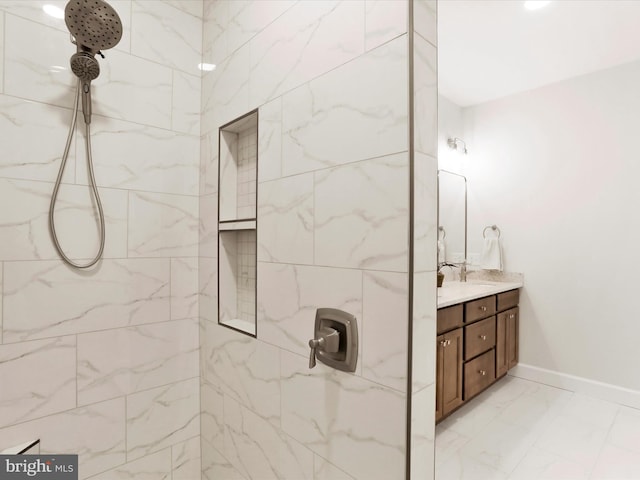 149 Matthew Dr, Chambersburg, PA 17201 - bathroom featuring vanity, marble finish floor, baseboards, and a marble finish shower