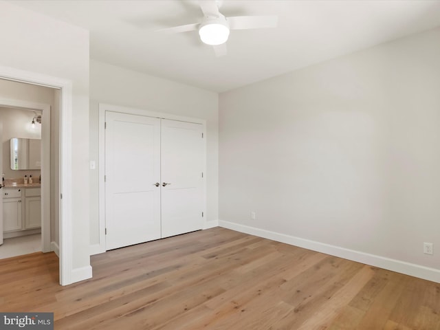 149 Matthew Dr, Chambersburg, PA 17201 - unfurnished bedroom with a closet, baseboards, ceiling fan, and light wood-style floors