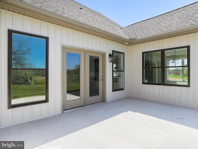 149 Matthew Dr, Chambersburg, PA 17201 - property entrance with a shingled roof and a patio area