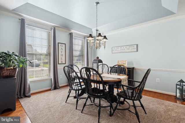 16 Zachary Ct, Boonsboro, MD 21713 - dining area featuring a chandelier, wood finished floors, a raised ceiling, and ornamental molding
