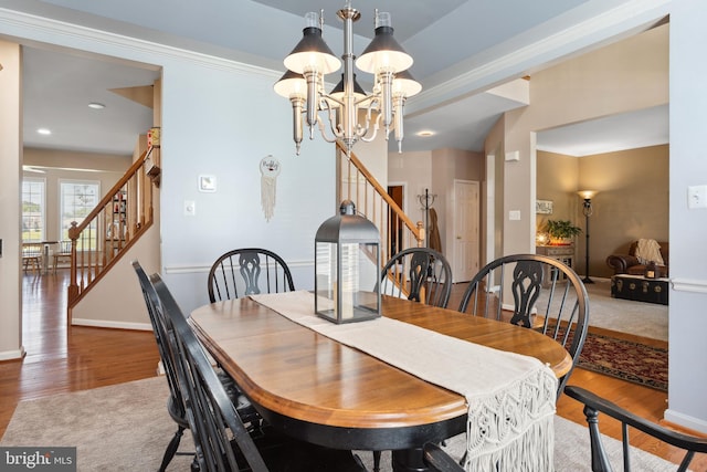 16 Zachary Ct, Boonsboro, MD 21713 - dining area with stairs, wood finished floors, a chandelier, crown molding, and recessed lighting