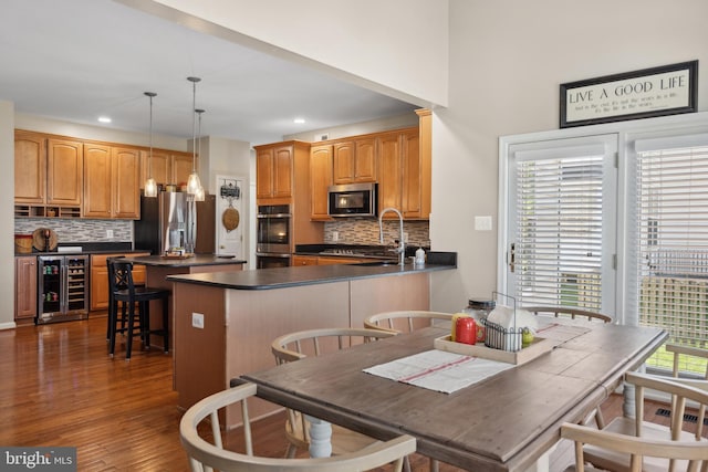 16 Zachary Ct, Boonsboro, MD 21713 - dining space with wine cooler, dark wood finished floors, and recessed lighting
