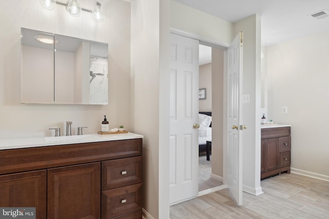 16 Zachary Ct, Boonsboro, MD 21713 - full bath with vanity, wood finished floors, ensuite bathroom, and baseboards