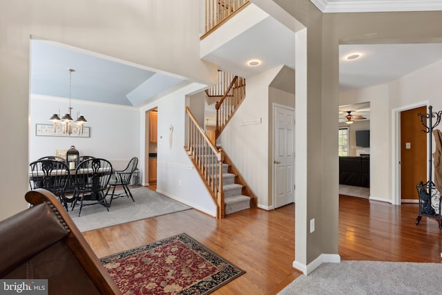 16 Zachary Ct, Boonsboro, MD 21713 - dining space featuring stairway, wood finished floors, ceiling fan, baseboards, and a chandelier