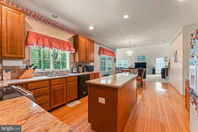 25 Stallion Cir, Upper Holland, PA 19053 - kitchen with a sink, a chandelier, a center island, black appliances, and open floor plan