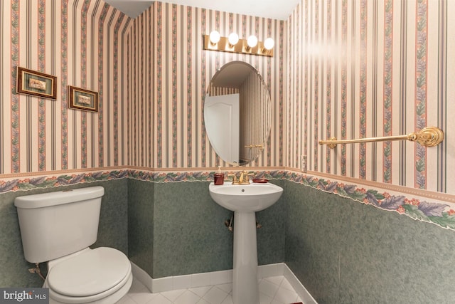 25 Stallion Cir, Upper Holland, PA 19053 - bathroom featuring toilet, wallpapered walls, and tile patterned floors