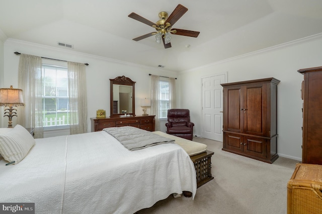 bedroom featuring light colored carpet, crown molding, visible vents, and ceiling fan