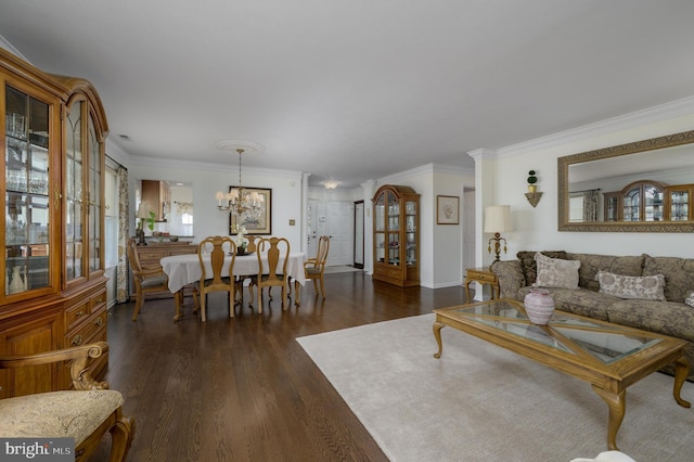 living area with crown molding, dark wood-type flooring, and a wealth of natural light