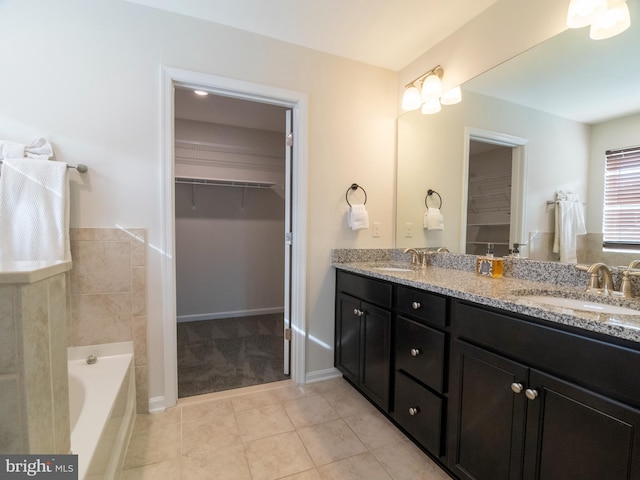 9318 Sydney Way, Laurel, MD 20723 - full bath featuring tile patterned floors, a spacious closet, and a sink