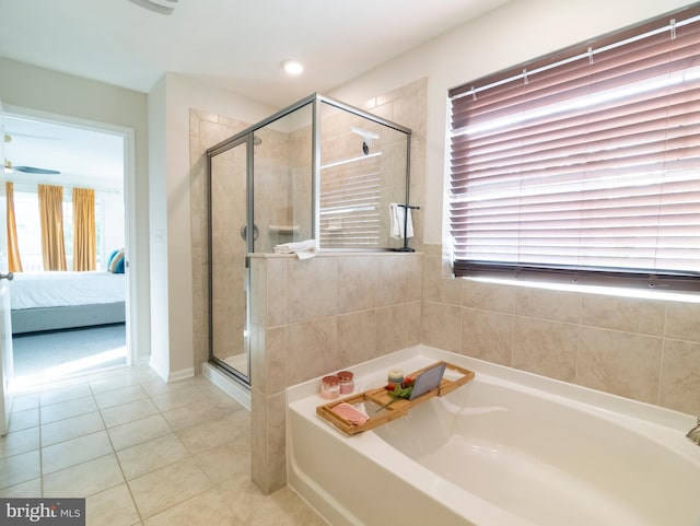 9318 Sydney Way, Laurel, MD 20723 - ensuite bathroom featuring tile patterned floors, a shower stall, a wealth of natural light, and ensuite bath