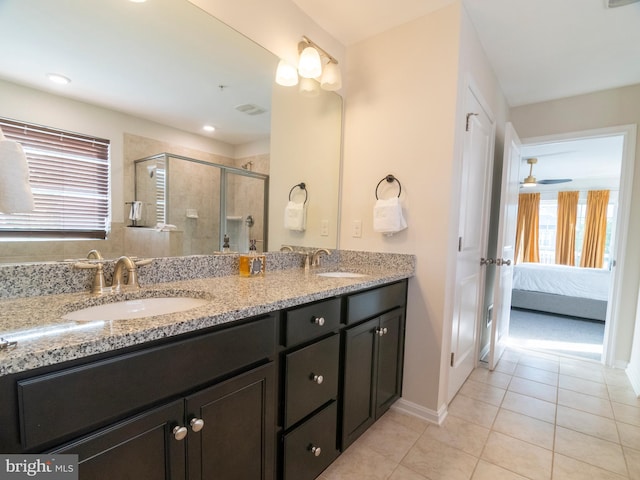 9318 Sydney Way, Laurel, MD 20723 - ensuite bathroom with a sink, tile patterned floors, a shower stall, and double vanity