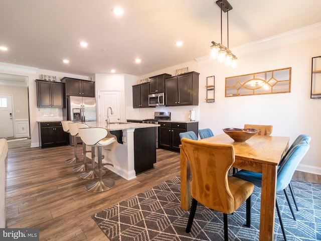 9318 Sydney Way, Laurel, MD 20723 - dining space with crown molding, recessed lighting, and dark wood-style floors