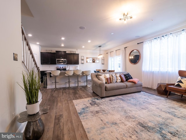 9318 Sydney Way, Laurel, MD 20723 - living room with crown molding, recessed lighting, stairs, and dark wood finished floors