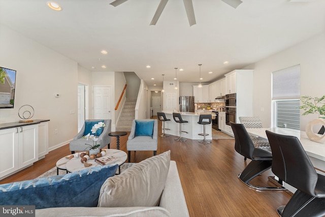 213 Denison St, Fredericksburg, VA 22406 - living area featuring ceiling fan, baseboards, dark wood-style flooring, recessed lighting, and stairs
