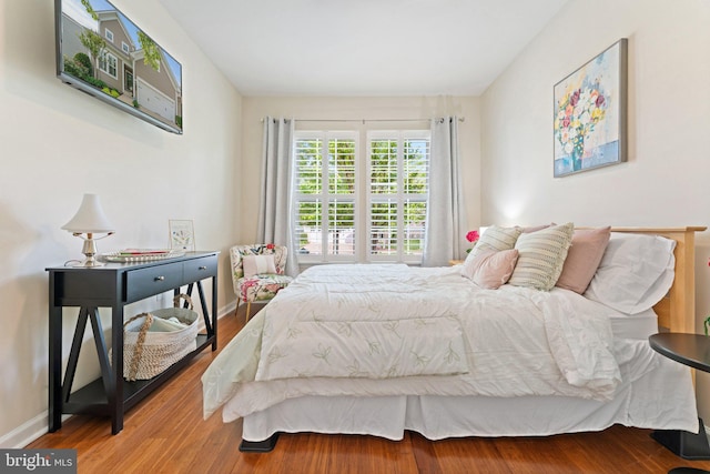 213 Denison St, Fredericksburg, VA 22406 - bedroom with baseboards and wood finished floors