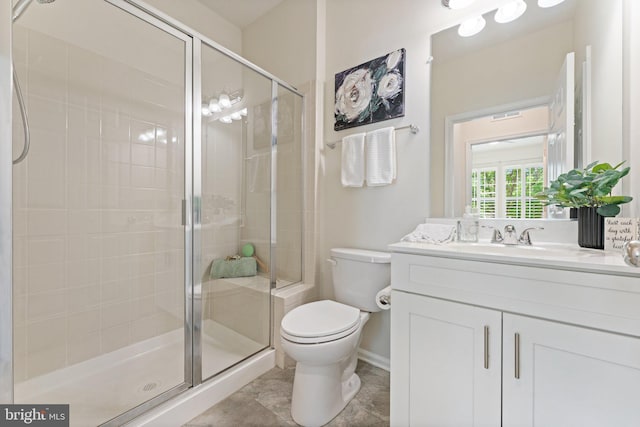 213 Denison St, Fredericksburg, VA 22406 - bathroom featuring toilet, a shower stall, vanity, and baseboards