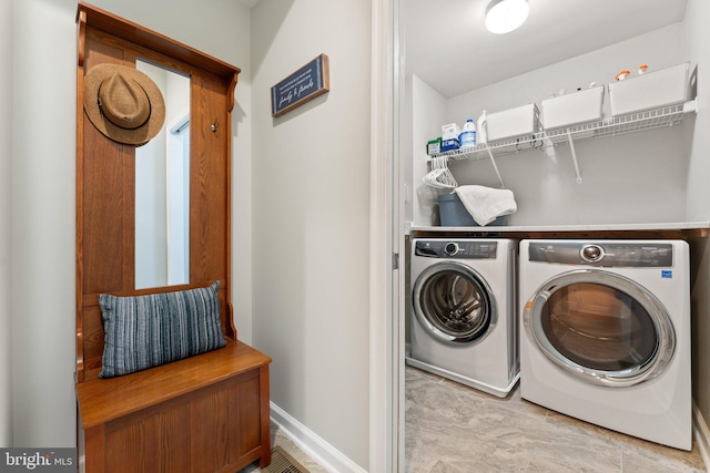 213 Denison St, Fredericksburg, VA 22406 - clothes washing area with washer and dryer, laundry area, and baseboards